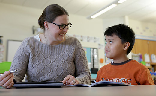 Teacher assessing student