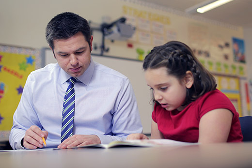 Teacher assessing student