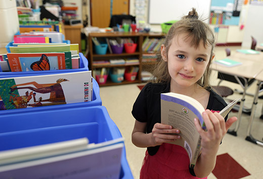 Child reading Choice Library book