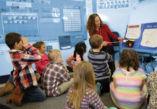 Teacher interacting with students