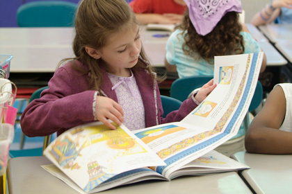 Student reading in class