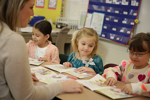 Teacher interacting with students