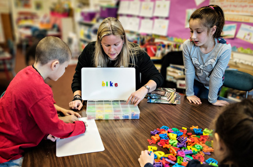 Teacher working with young children