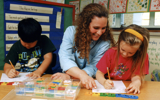 Teacher working with young children